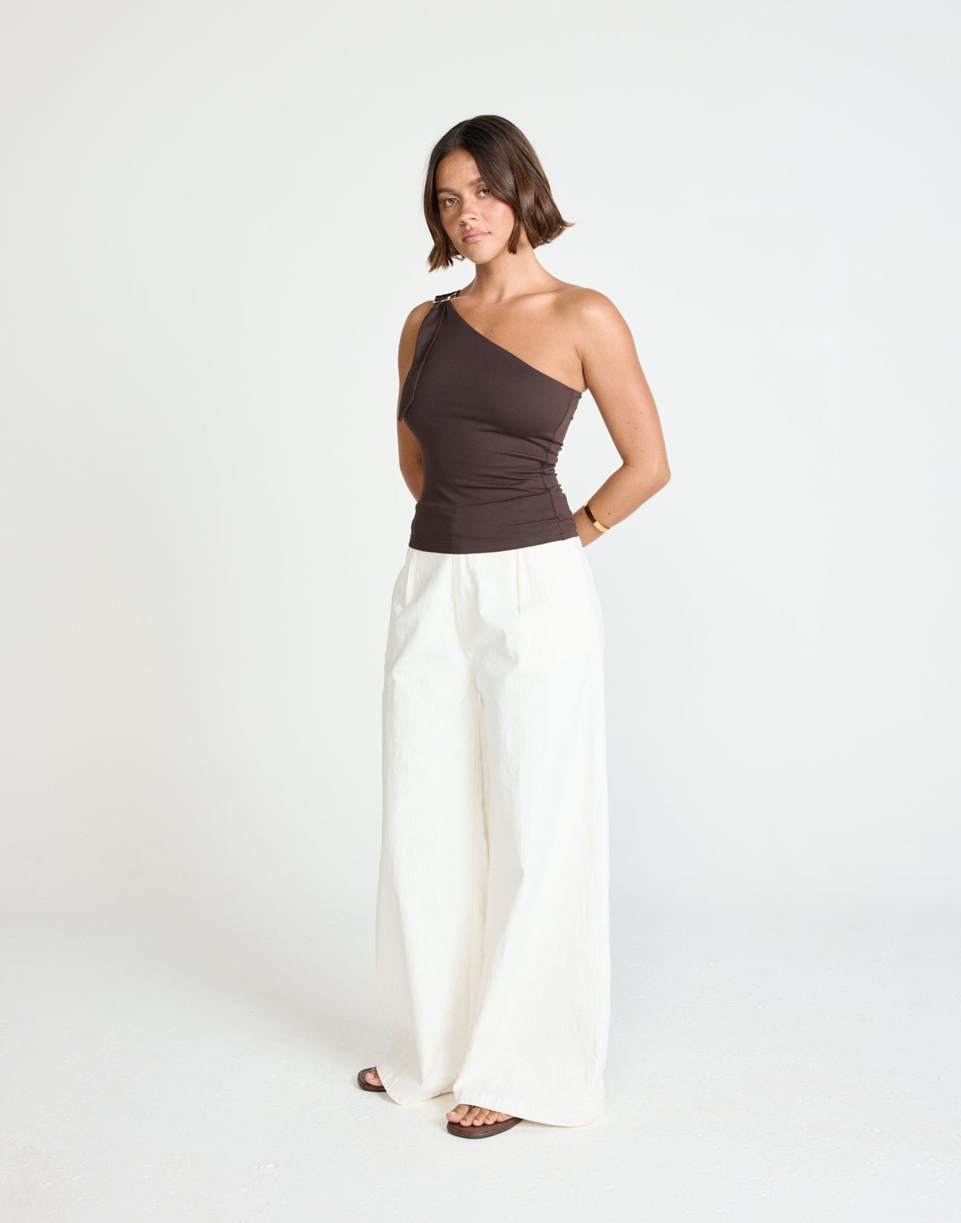 Zuelia Top (Chocolate) | CHARCOAL Exclusive - Asymmetrical Neckline Top with Gold Embellishment - Women's Top - Charcoal Clothing