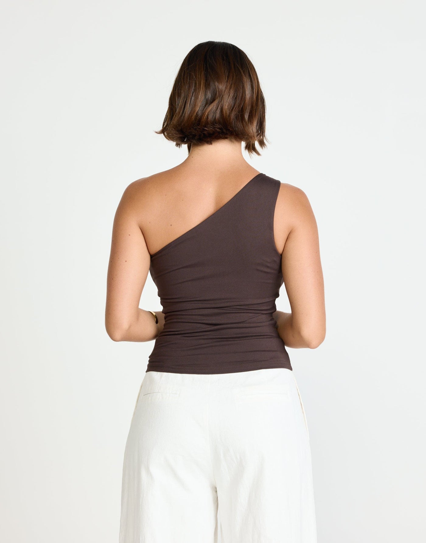 Zuelia Top (Chocolate) | CHARCOAL Exclusive - Asymmetrical Neckline Top with Gold Embellishment - Women's Top - Charcoal Clothing