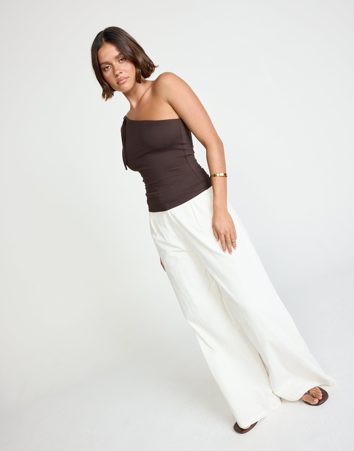 Zuelia Top (Chocolate) | CHARCOAL Exclusive - Asymmetrical Neckline Top with Gold Embellishment - Women's Top - Charcoal Clothing
