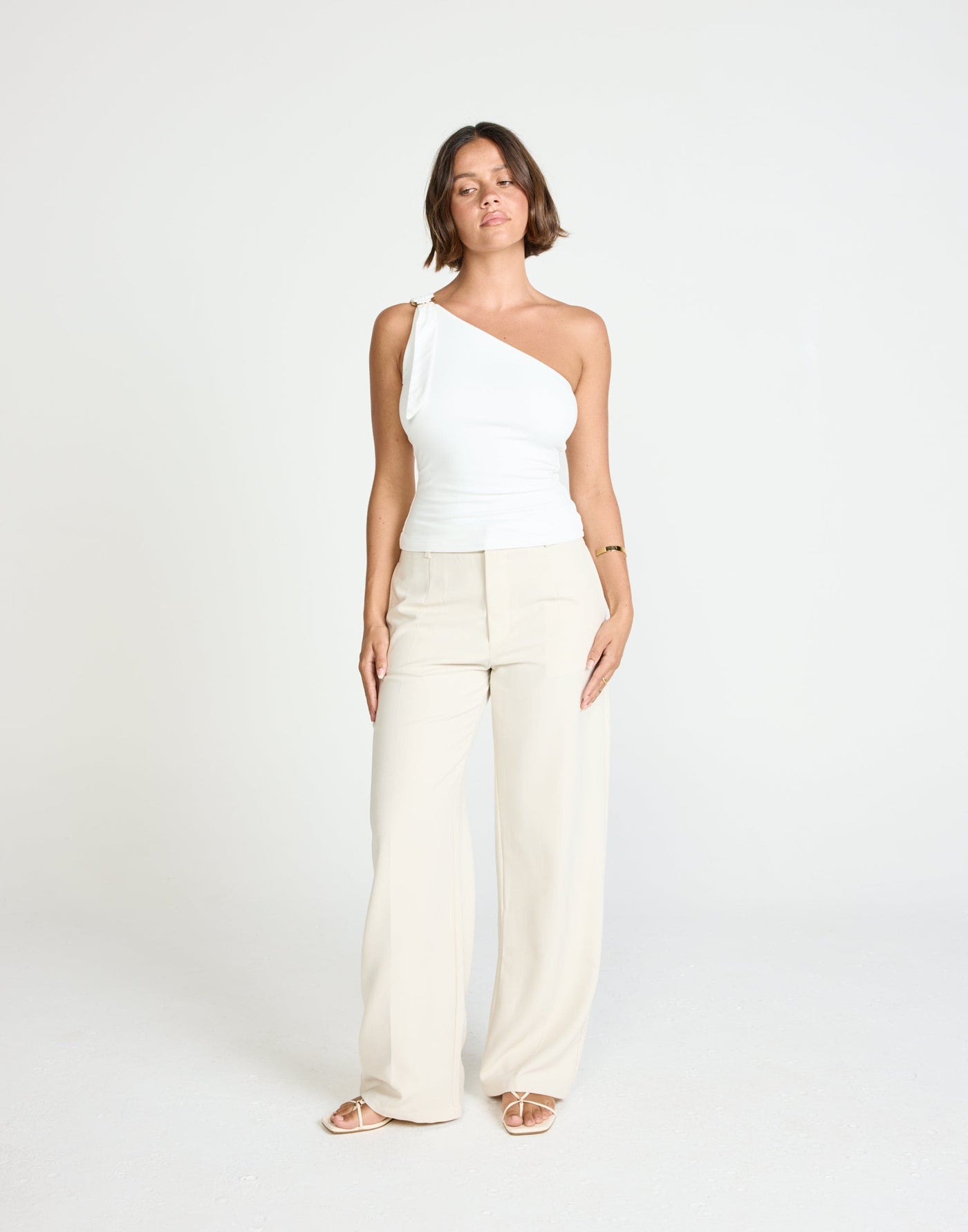 Zuelia Top (White) | CHARCOAL Exclusive - Asymmetrical Neckline Top with Gold Embellishment - Women's Top - Charcoal Clothing